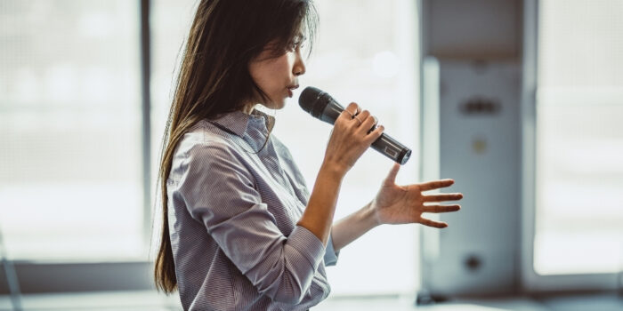 A professional woman doing a webinar