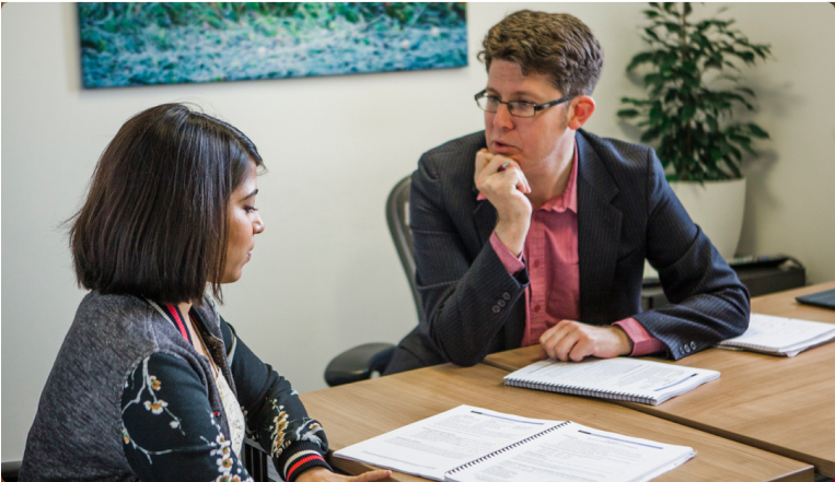 Interview coaching session with a professional preparing and practising interview responses